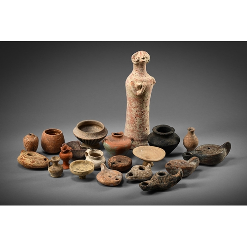 658 - ANTIQUITIES TO INCLUDE: A a standing stylised pottery figure, 29cm high  A collection of Roman and l... 