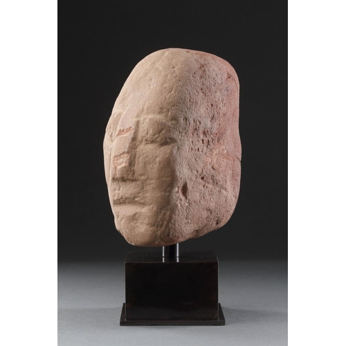 665 - AN ANCIENT BRITISH CELTIC RED SANDSTONE HEAD 1ST CENTURY BC-1ST CENTURY AD Of unusual shape with a l... 