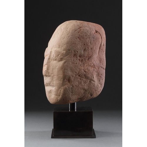 665 - AN ANCIENT BRITISH CELTIC RED SANDSTONE HEAD 1ST CENTURY BC-1ST CENTURY AD Of unusual shape with a l... 