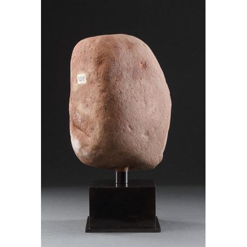 665 - AN ANCIENT BRITISH CELTIC RED SANDSTONE HEAD 1ST CENTURY BC-1ST CENTURY AD Of unusual shape with a l... 