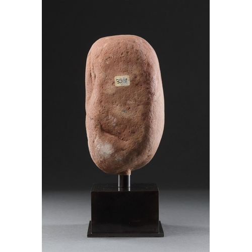 665 - AN ANCIENT BRITISH CELTIC RED SANDSTONE HEAD 1ST CENTURY BC-1ST CENTURY AD Of unusual shape with a l... 