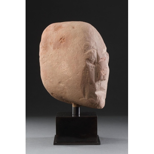 665 - AN ANCIENT BRITISH CELTIC RED SANDSTONE HEAD 1ST CENTURY BC-1ST CENTURY AD Of unusual shape with a l... 