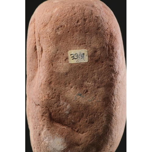 665 - AN ANCIENT BRITISH CELTIC RED SANDSTONE HEAD 1ST CENTURY BC-1ST CENTURY AD Of unusual shape with a l... 