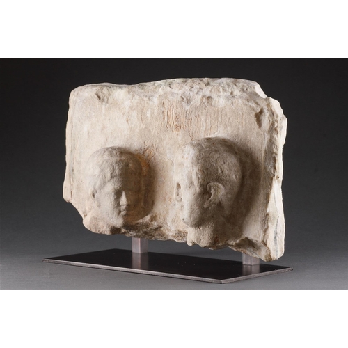 667 - A HELLENISTIC MARBLE FUNERARY STELE IN HIGH RELIEF CIRCA 2ND CENTURY BC With two male heads, modern ... 