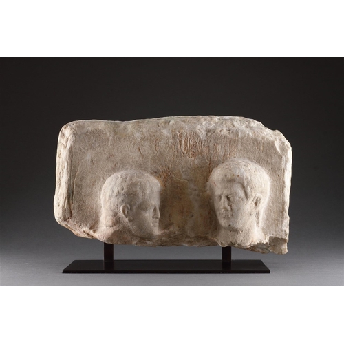 667 - A HELLENISTIC MARBLE FUNERARY STELE IN HIGH RELIEF CIRCA 2ND CENTURY BC With two male heads, modern ... 