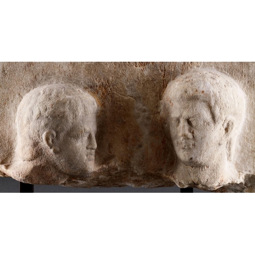 667 - A HELLENISTIC MARBLE FUNERARY STELE IN HIGH RELIEF CIRCA 2ND CENTURY BC With two male heads, modern ... 