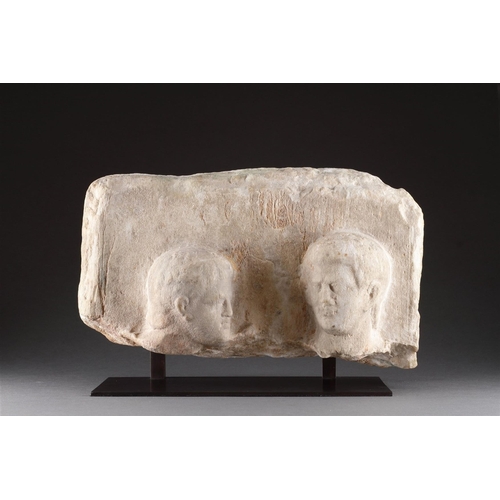 667 - A HELLENISTIC MARBLE FUNERARY STELE IN HIGH RELIEF CIRCA 2ND CENTURY BC With two male heads, modern ... 