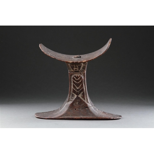 669 - A RARE AND FINELY CARVED EGYPTIAN WOODEN HEADREST RAMESSID PERIOD / 13TH-12TH CENTURY B.C With a car... 