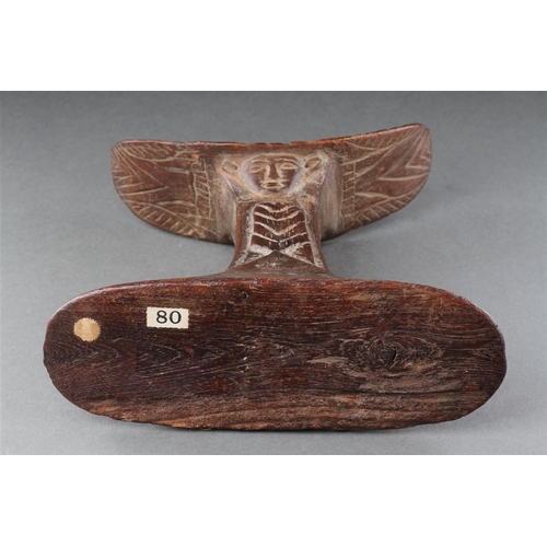 669 - A RARE AND FINELY CARVED EGYPTIAN WOODEN HEADREST RAMESSID PERIOD / 13TH-12TH CENTURY B.C With a car... 