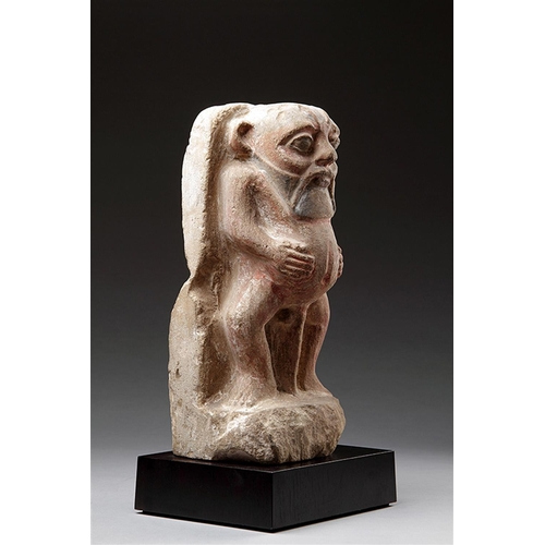 670 - AN ANCIENT EGYPTIAN PTOLEMAIC LIMESTONE FIGURE OF THE GROTESQUE DWARF GOD 'BES' PTOLEMAIC PERIOD 332... 