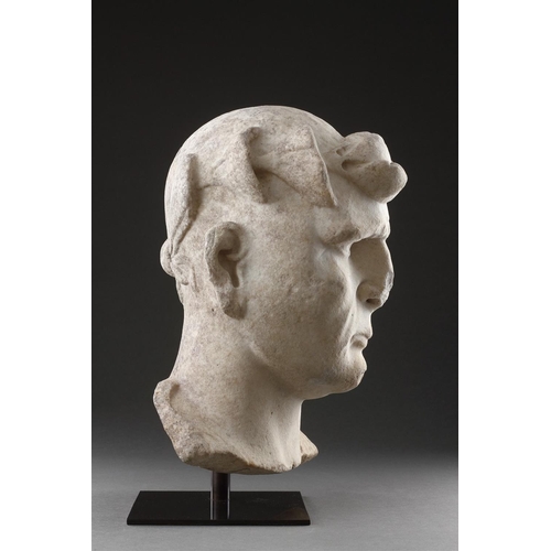 673 - AN OVER LIFE-SIZE ROMAN MALE PORTRAIT HEAD OF CONSTANTINE THE GREAT (C.272 - 337) EARLY 4TH CENTURY ... 