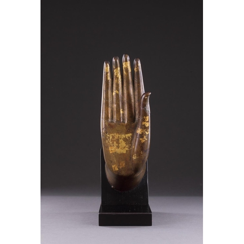 706 - A FINE LARGE GILT BRONZE HAND OF THE BUDDHA SHAKYAMUNI MING DYNASTY (1368-1644) 16TH CENTURY With lo... 