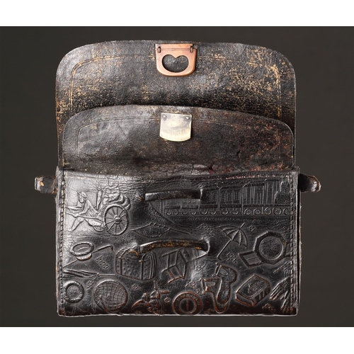 713 - AN UNUSUAL NAMBAN LEATHER WALLET NAGASAKI, JAPAN, CIRCA 1870S The whole surface embossed with scenes... 