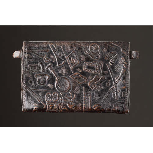 713 - AN UNUSUAL NAMBAN LEATHER WALLET NAGASAKI, JAPAN, CIRCA 1870S The whole surface embossed with scenes... 