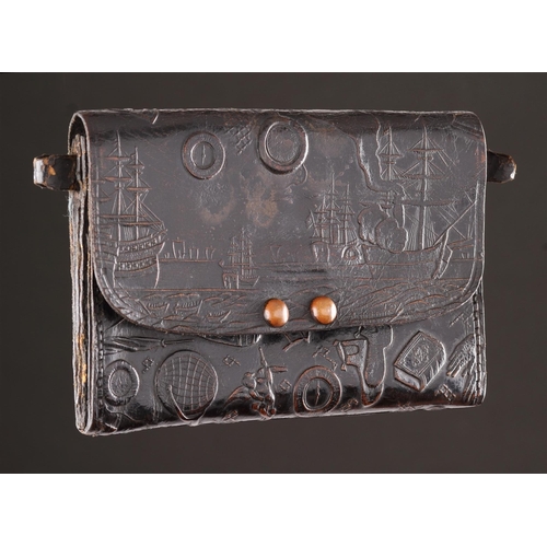 713 - AN UNUSUAL NAMBAN LEATHER WALLET NAGASAKI, JAPAN, CIRCA 1870S The whole surface embossed with scenes... 