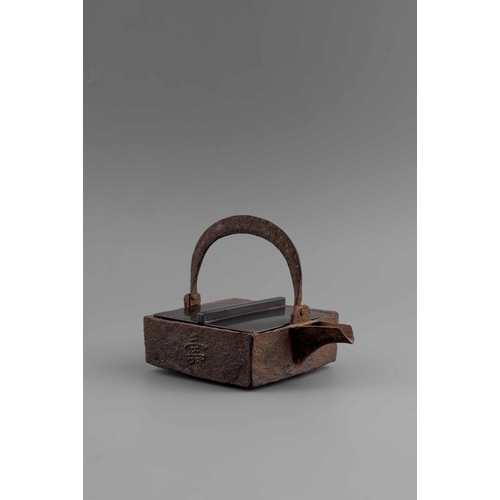 724 - A JAPANESE IRON CEREMONIAL TEAPOT 18TH/19TH CENTURY Inscription to three sides: Fuku - Roku - Ju (tr... 