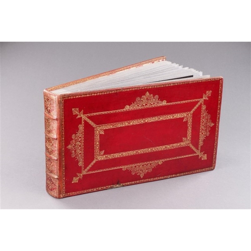 730 - A MUSEUM RED MOROCCO LEATHER PHOTOGRAPH ALBUM OF ANTIQUE CUTLERY 19TH CENTURY Illustrating a fine co... 