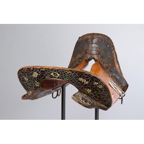 755 - A RARE WESTERN TIBETAN HORSE SADDLE AS USED BY THE KAMPA HORSEMEN 19TH CENTURY The wood frame inlaid... 