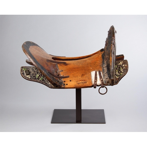 755 - A RARE WESTERN TIBETAN HORSE SADDLE AS USED BY THE KAMPA HORSEMEN 19TH CENTURY The wood frame inlaid... 