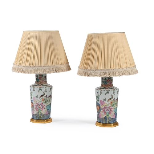 764 - A PAIR OF CERAMIC LAMPS DECORATED IN THE 'TOBACCO LEAF' PATTERN CONTEMPORARY Four light fitments, se... 