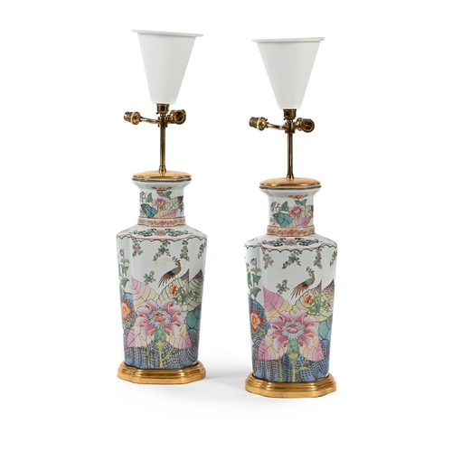 764 - A PAIR OF CERAMIC LAMPS DECORATED IN THE 'TOBACCO LEAF' PATTERN CONTEMPORARY Four light fitments, se... 