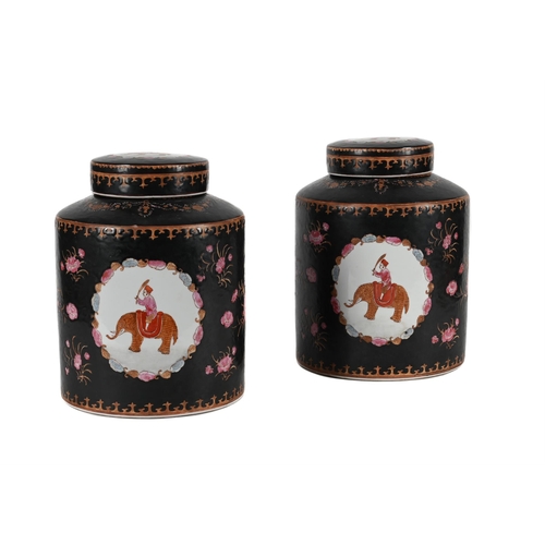 784 - A PAIR OF CHINESE EXPORT STYLE FAMILLE NOIRE CANNISTERS AND COVERS LATE 20TH CENTURY31cm high