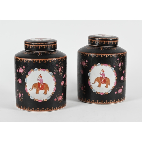 784 - A PAIR OF CHINESE EXPORT STYLE FAMILLE NOIRE CANNISTERS AND COVERS LATE 20TH CENTURY31cm high