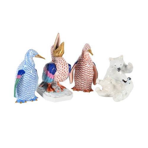 793 - A COLLECTION OF THREE MODERN HEREND MODELS OF ANIMALS Comprising two penguins and a pelicanBlue fact... 