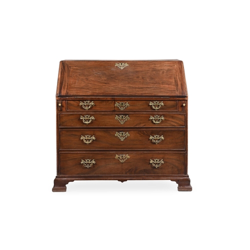 798 - A GEORGE III MAHOGANY BUREAU CIRCA 1770 Fall front enclosing well fitted interior with well recess, ... 