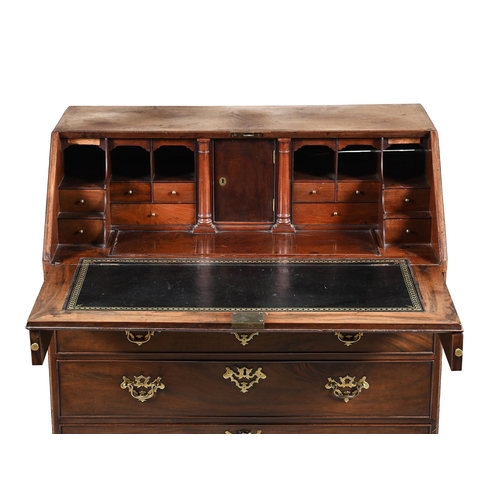 798 - A GEORGE III MAHOGANY BUREAU CIRCA 1770 Fall front enclosing well fitted interior with well recess, ... 