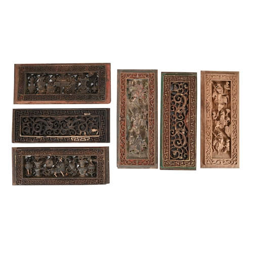 800 - A SET OF TWENTY FOUR CHINESE CARVED PANELS19TH CENTURYCentre sections carved with  various motifs, f... 