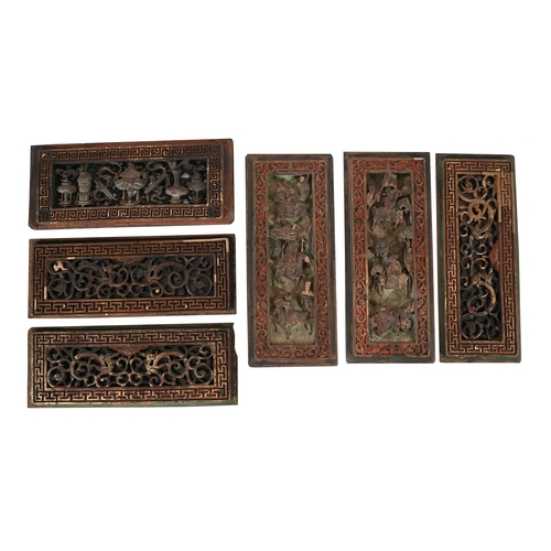 800 - A SET OF TWENTY FOUR CHINESE CARVED PANELS19TH CENTURYCentre sections carved with  various motifs, f... 