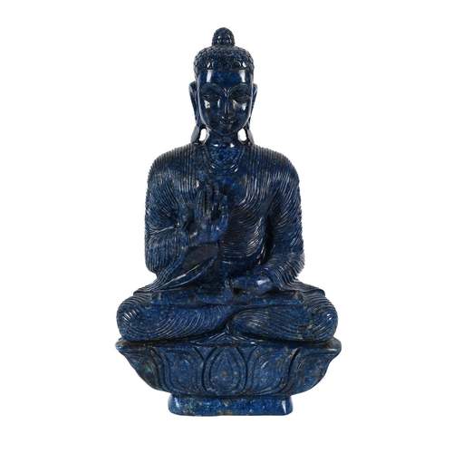 801 - A LARGE LAPIS LAZULI MODEL OF A BUDDHA20TH CENTURYSeated on a lotus thrown45cm high