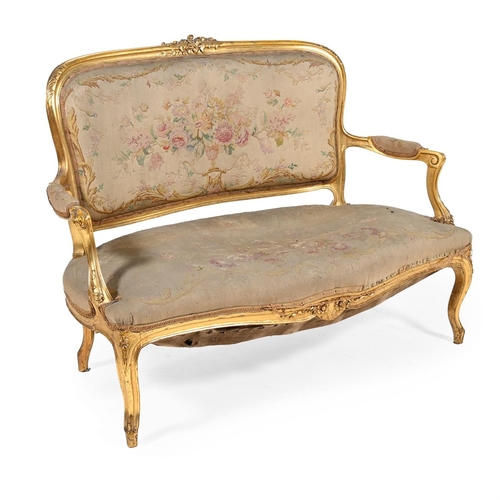 804 - A FRENCH GILTWOOD SALON SUITE IN LOUIS XV STYLE 19TH CENTURY Comprising a sofa and four armchairs, t... 