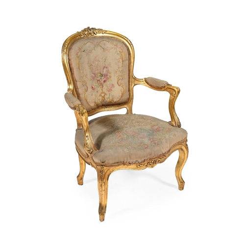 804 - A FRENCH GILTWOOD SALON SUITE IN LOUIS XV STYLE 19TH CENTURY Comprising a sofa and four armchairs, t... 