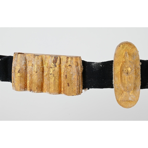 808 - AN AKAN STYLE GILTWOOD MODEL OF A BELT MODERNComposed of five mounted ornaments overall 63cm long