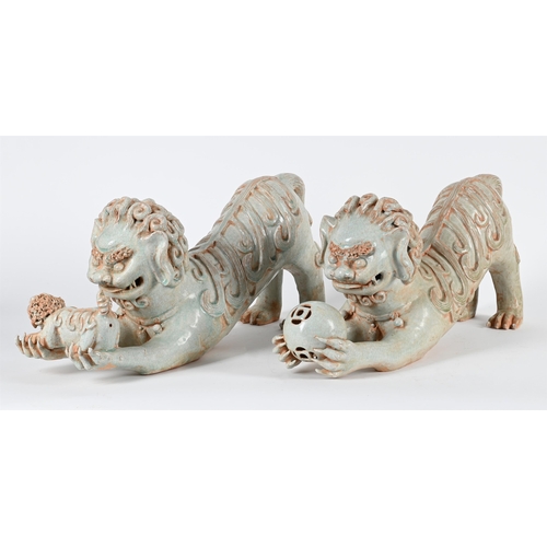 814 - A PAIR OF CHINESE PORCELAIN CELADON GLAZE MODELS OF LIONS AND CUBS20TH CENTURY 58cm long