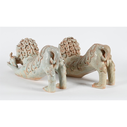 814 - A PAIR OF CHINESE PORCELAIN CELADON GLAZE MODELS OF LIONS AND CUBS20TH CENTURY 58cm long