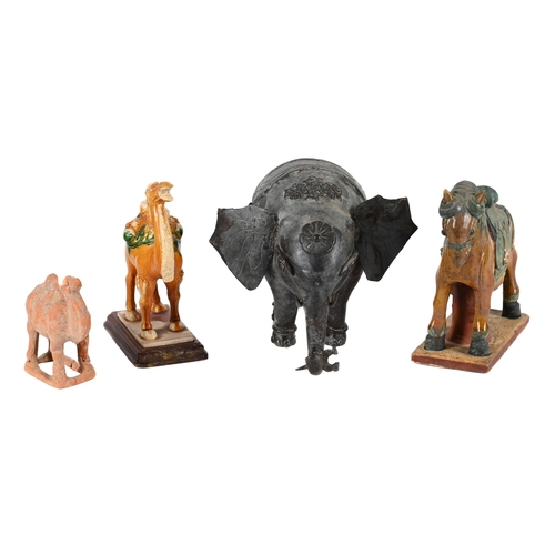 818 - A PATINATED METAL MODEL OF AN ELEPHANT20TH CENTURY 24cm high, 32cm long TOGETHER WITH A tang style p... 