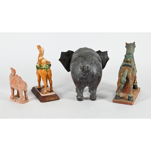 818 - A PATINATED METAL MODEL OF AN ELEPHANT20TH CENTURY 24cm high, 32cm long TOGETHER WITH A tang style p... 