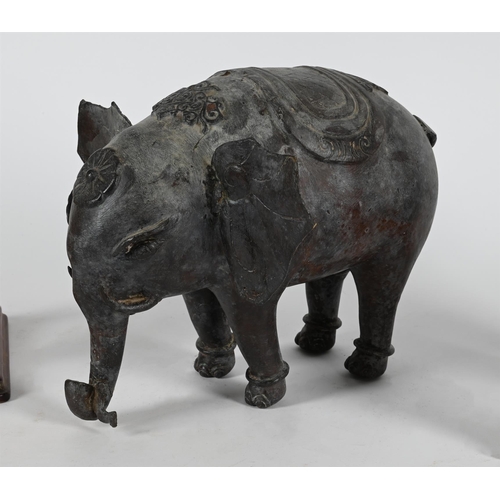 818 - A PATINATED METAL MODEL OF AN ELEPHANT20TH CENTURY 24cm high, 32cm long TOGETHER WITH A tang style p... 