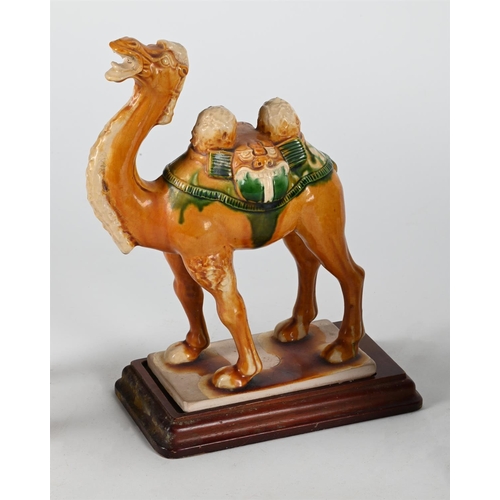 818 - A PATINATED METAL MODEL OF AN ELEPHANT20TH CENTURY 24cm high, 32cm long TOGETHER WITH A tang style p... 