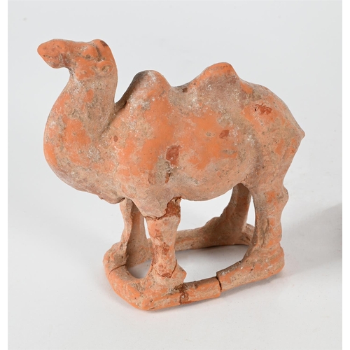 818 - A PATINATED METAL MODEL OF AN ELEPHANT20TH CENTURY 24cm high, 32cm long TOGETHER WITH A tang style p... 