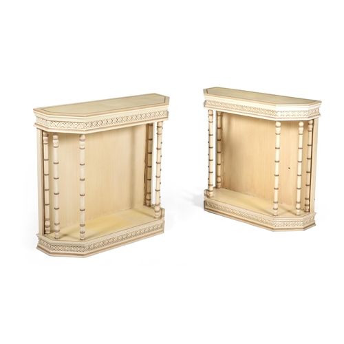 878 - A PAIR OF CREAM PAINTED SIDE OR CONSOLE TABLESIN THE MANNER OF OLIVER MESSEL, LATE 20TH CENTURY each... 