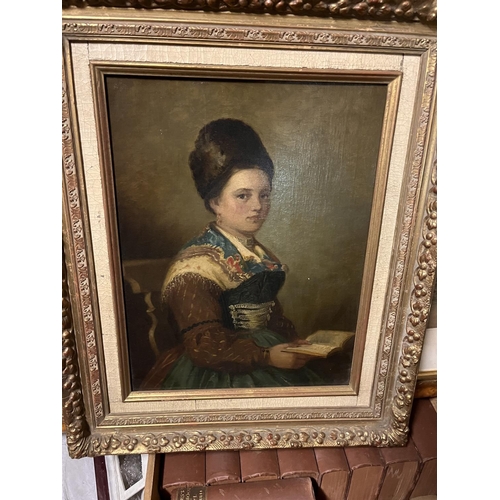 137 - CONTINENTAL SCHOOL (19TH CENTURY)PORTRAIT OF A LADY, HOLDING A BOOKOil on canvas44 x 34cm (17¼ x 13¼... 