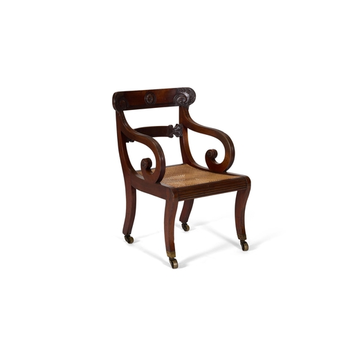 65 - A GEORGE IV MAHOGANY LIBRARY ARMCHAIR CIRCA 1825, IN THE MANNER OF GILLOWSThe bar back with scroll c... 