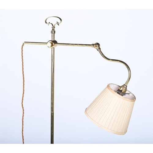 550 - A BRASS ADJUSTABLE READING LAMP BY ROBERT KIME LTD, MODERN103cm high minimum, 157cm high maximum, th... 