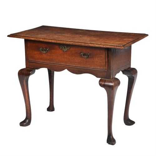 551 - A GEORGE II OAK SIDE TABLE CIRCA 1740The rectangular top above a frieze drawer and cabriole legs73cm... 