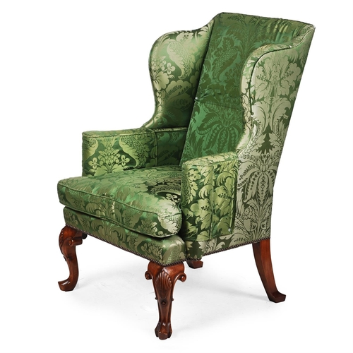 560 - A WALNUT WING ARMCHAIR IN GEORGE II STYLE MID 20TH CENTURYapproximately 115cm high, 82cm wide, 77cm ... 