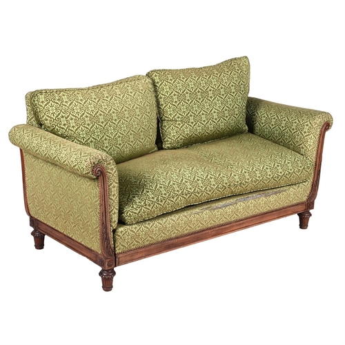 566 - A MAHOGANY AND UPHOLSTERED METAMORPHIC SOFAIN REGENCY STYLE, LATE 19TH OR EARLY 20TH CENTURYOne end ... 